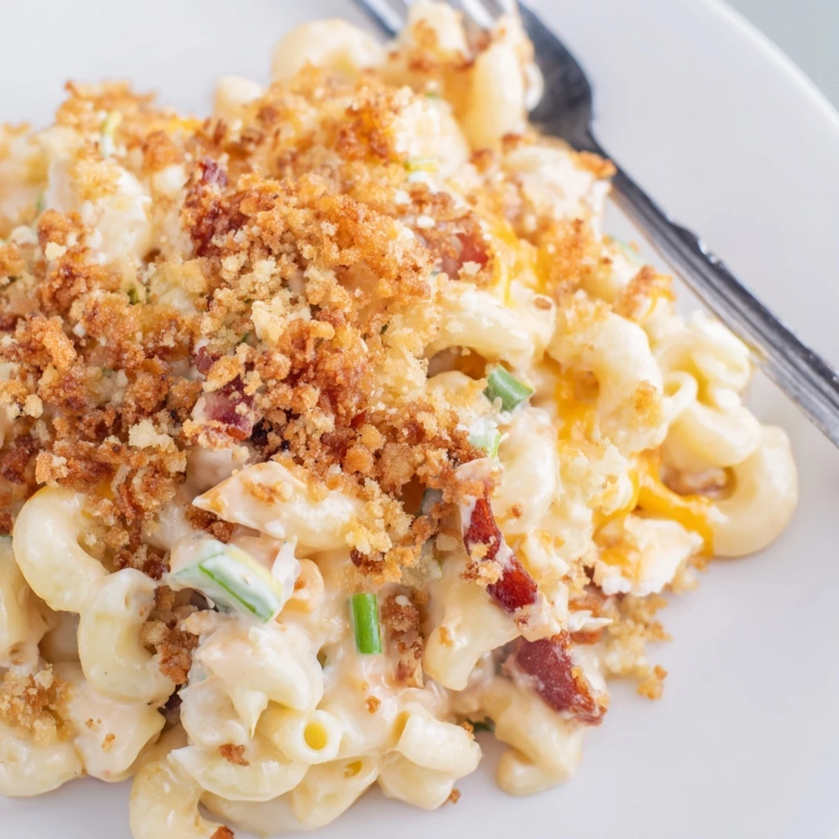 Creamy Spicy Kimchi Mac & Cheese topped with crunchy sesame for bold flavors.  