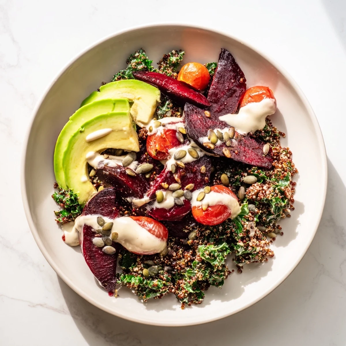 Enjoy a filling Quinoa, Kale & Roasted Beet Bowl with tender beets and toasted pumpkin seeds tonight!