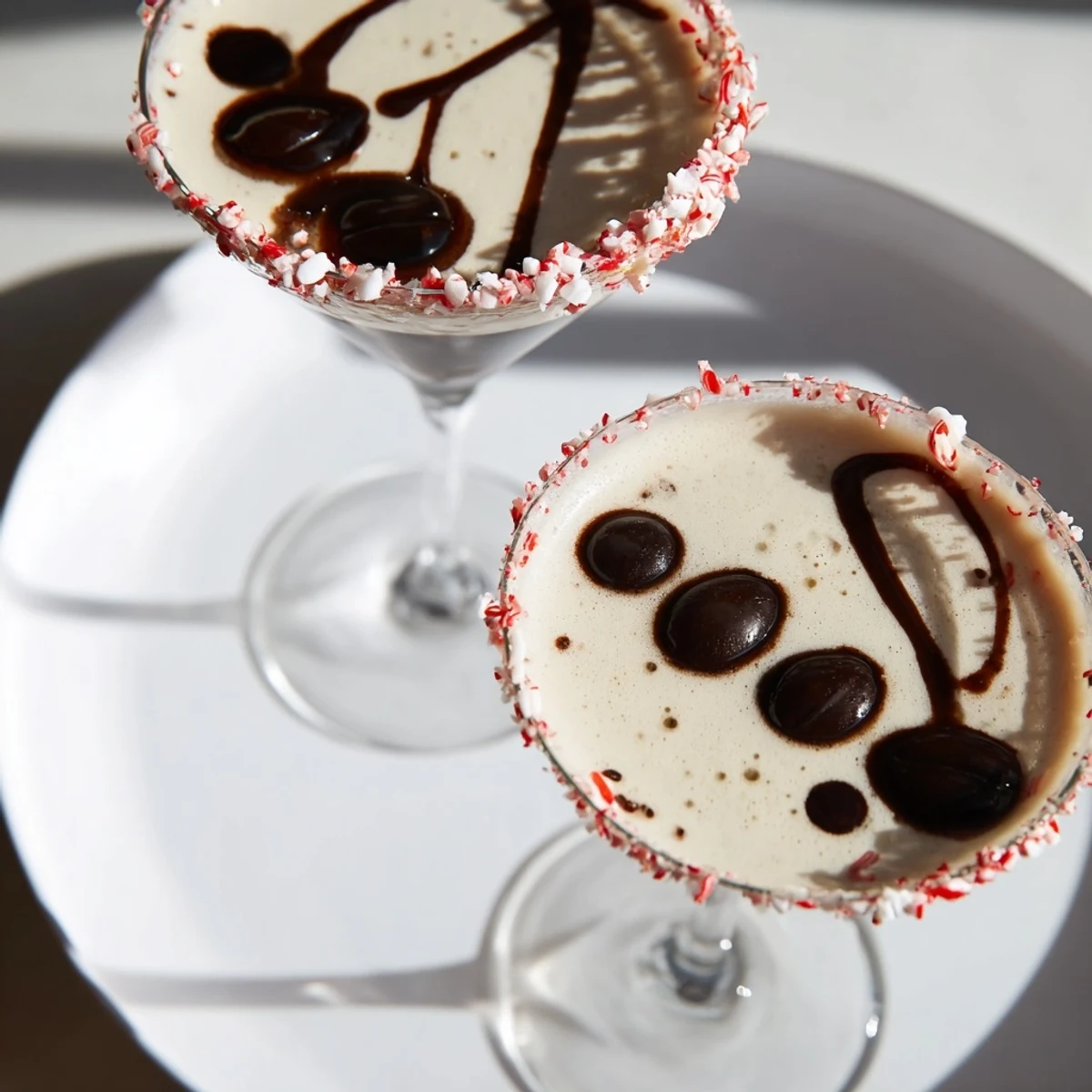 Creamy Peppermint Espresso Martinis, garnished with espresso beans, ready for a holiday toast.