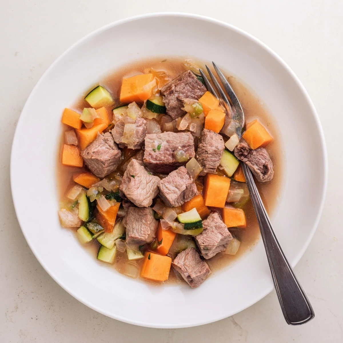 This baby-friendly Sweet Lamb Platter shows a heartwarming presentation of a homemade dish for infants.