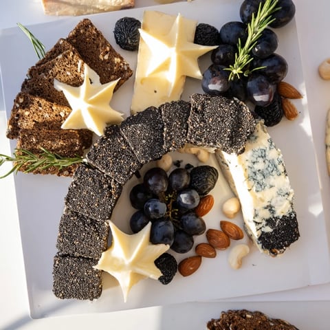 A beautifully arranged Crescent Moon & Stars Cheese Board, perfect for elegant appetizers with assorted cheeses.
