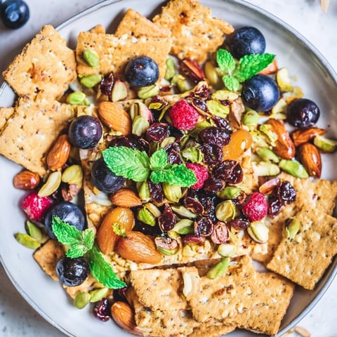 The Picket Fence appetizer: A colorful mix of nuts and berries overflowing within a cracker border.