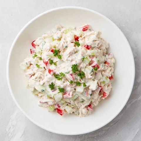 Chunky Canned Chicken Salad with Mrs. Dash, ready to eat, featuring diced veggies and herbs.