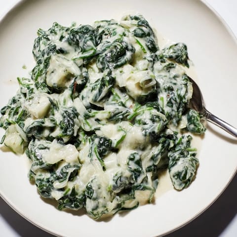 A delicious creamed spinach dish, perfect for pairing with steak or chicken dinners.  