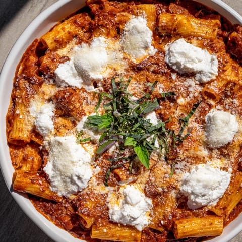 Warm and cheesy One-Pan Baked Ziti with herbs, perfect for a satisfying family dinner tonight.