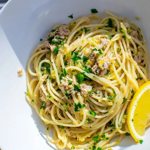 Steaming plate of Lemon-Garlic Tuna Spaghetti, a quick weeknight dinner bursting with delicious flavors.